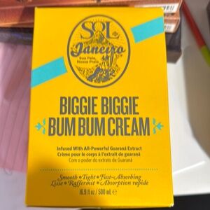 Sol de Janeiro Biggie Biggie Bum Bum Cream 
With the surfboard applicator